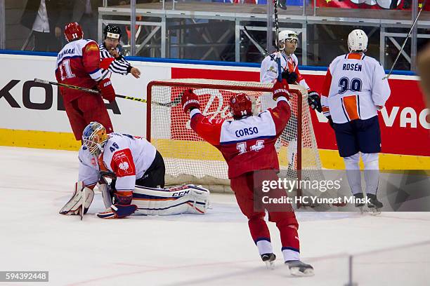 Jesse Niinimaki and Daniel Korso of Yunost-Minsk celebrate the decisive goal during the overtime of the Champions Hockey League group stage game...