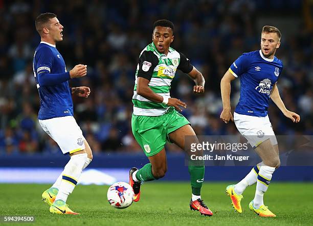 Tahvon Campbell of Yeovil Town takes on Ross Barkley and Tom Cleverley of Everton during the EFL Cup second round match between Everton and Yeovil...