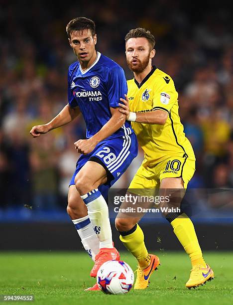 Cesar Azpilicueta of Chelsea is closed down by Matty Taylor of Bristol Rovers during the EFL Cup second round match between Chelsea and Bristol...