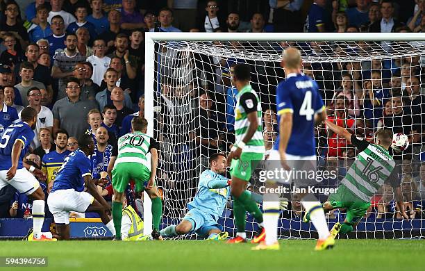 Arouna Kone of Everton scores his sides fourth goal during the EFL Cup second round match between Everton and Yeovil Town at Goodison Park on August...