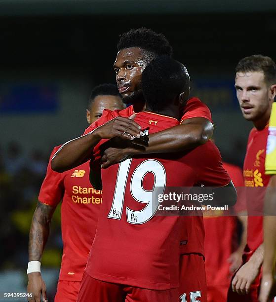 Daniel Sturridge of Liverpool celebrates after scoring the fourth during the EFL Cup match between Burton Albion and Liverpool at the Pirelli Stadium...