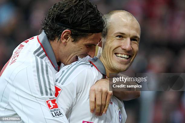 Mario Gomez with Arjen Robben after he scored to make it 0-1