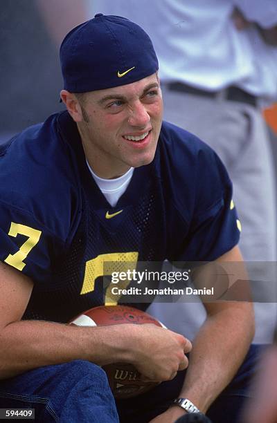 Drew Henson of the Michigan Wolverines looks on as he sits on the sidelines during the game against the Bowling Green Falcons at the Michigan Stadium...