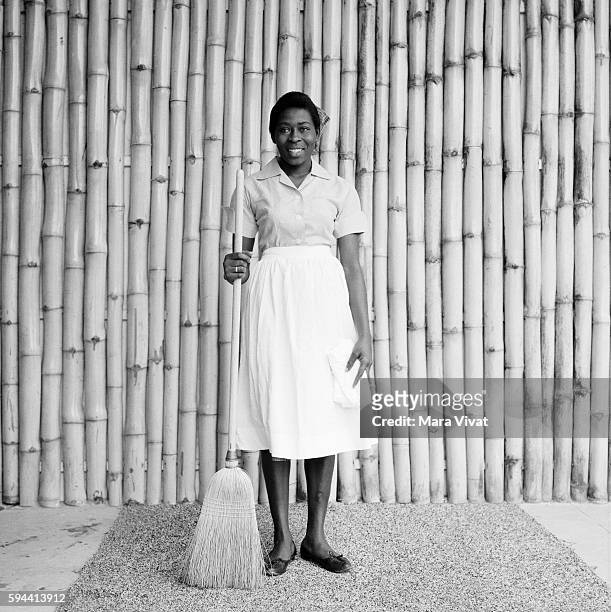 Resort Housekeeper Holding Broom