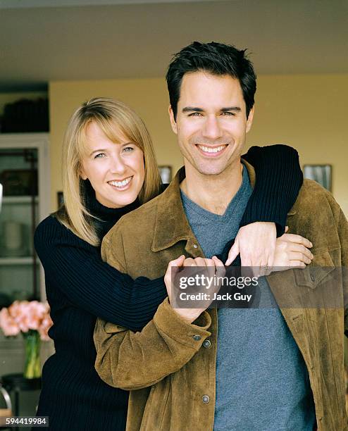 Actor Eric McCormack and wife Janet Holden are photographed for InStyle Magazine in 2001 at home in Los Angeles, California.