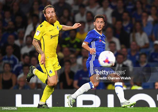 Eden Hazard of Chelsea takes on Stuart Sinclair of Bristol Rovers during the EFL Cup second round match between Chelsea and Bristol Rovers at...