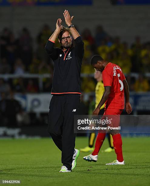 Jurgen Klopp manager of Liverpool shows his appreciation to the fans at the end of the EFL Cup match between Burton Albion and Liverpool at the...