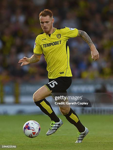 Tom Naylor of Burton during the EFL Cup match between Burton Albion and Liverpool at Pirelli Stadium on August 23, 2016 in Burton upon Trent, England.