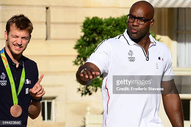 Teddy Riner judo Gold medalist and Christophe Lemaitre 200m Athltisme Bronze medalist arrive to the Elysee Palace for a cocktail reception given by...