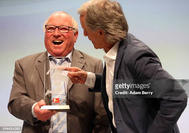 Former soccer player Uwe Seeler and former soccer player Wolfgang Overath attend a Bundesliga gala award evening on August 23, 2016 in Berlin,...