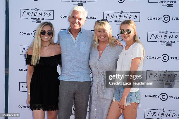 Molly Lowe, Phillip Schofield, Stephanie Lowe and Ruby Lowe attend launches Comedy Central's Friendfest at Haggerston Park on August 23, 2016 in...