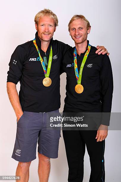 Eric Murray and Hamish Bond pose for a portrait with their Olympic Rowing Gold Medals during the New Zealand Olympic Games athlete home coming at The...