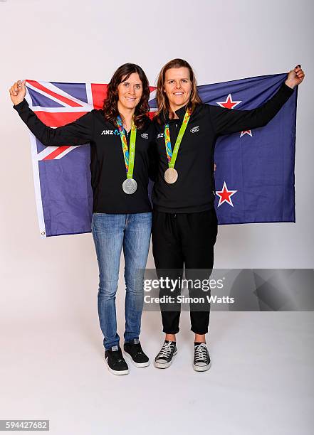 Jo Aleh and Polly Powri pose for a portrait with their Olympic Sailing Silver Medals during the New Zealand Olympic Games athlete home coming at The...