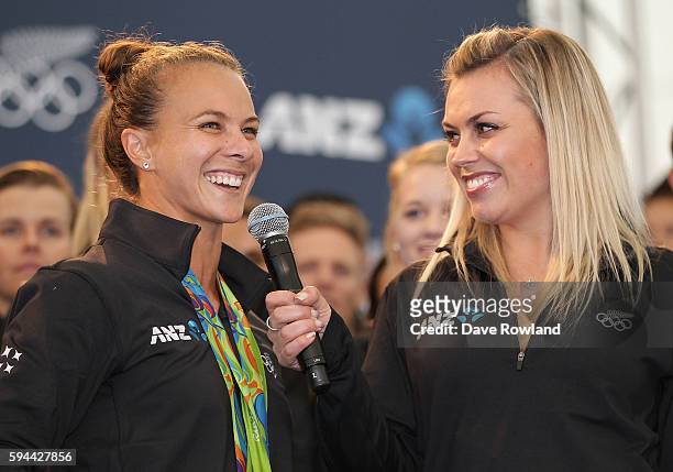 Gold and bronze canoe sprint medalist Lisa Carrington speaks with Laura McGoldrick during the New Zealand Olympic Games athlete home coming at...