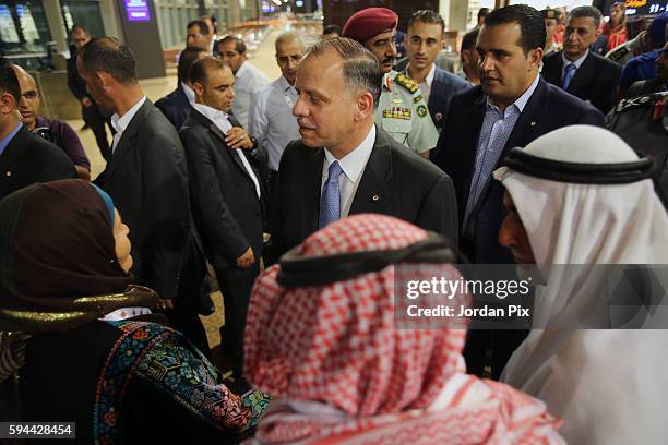 Prince Prince Faisal Bin Al Hussein greats medallist family as he attends to welcome home Jordanian Olympic gold medallist Ahmad Abu Goush and other...