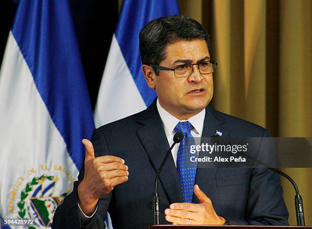 Juan Orlando Hernandez President of Honduras gives an speech during a meeting on August 23, 2016 in San Salvador, El Salvador. Presidents of the...