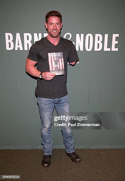 Noah Galloway signs copies of 'Living With No Excuses: The Remarkable Rebirth Of An American Soldier' at Barnes & Noble Tribeca on August 23, 2016 in...