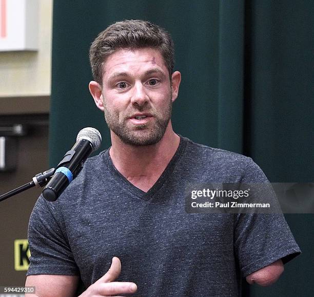 Noah Galloway signs copies of 'Living With No Excuses: The Remarkable Rebirth Of An American Soldier' at Barnes & Noble Tribeca on August 23, 2016 in...