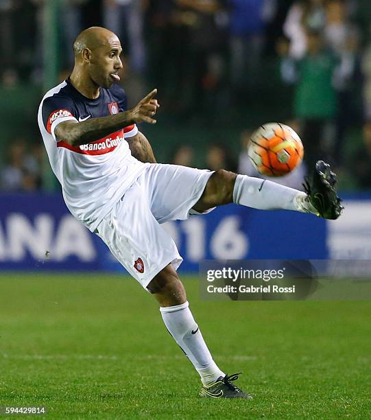 Juan Ignacio Mercier of San Lorenzo kicks the ball during a first leg match between Banfield and San Lorenzo as part of second round of Copa...