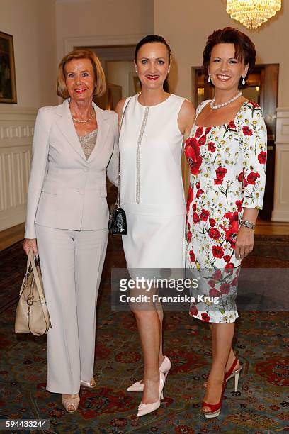 Jimmy Schmied, Brita Segger, Margit Toennies attend the Society Relations Ladies Lunch in favor of the Stiftung Deutsche Schlaganfall-Hilfe on August...