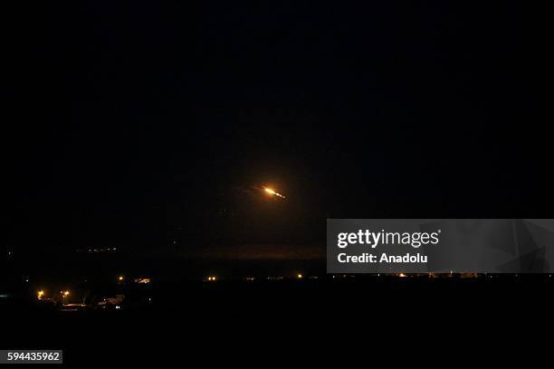 The photo taken from Karkamis district of the Turkey's Gaziantep province shows Turkish fighter jets bombing Daesh targets in Jarabulus, Syria on...