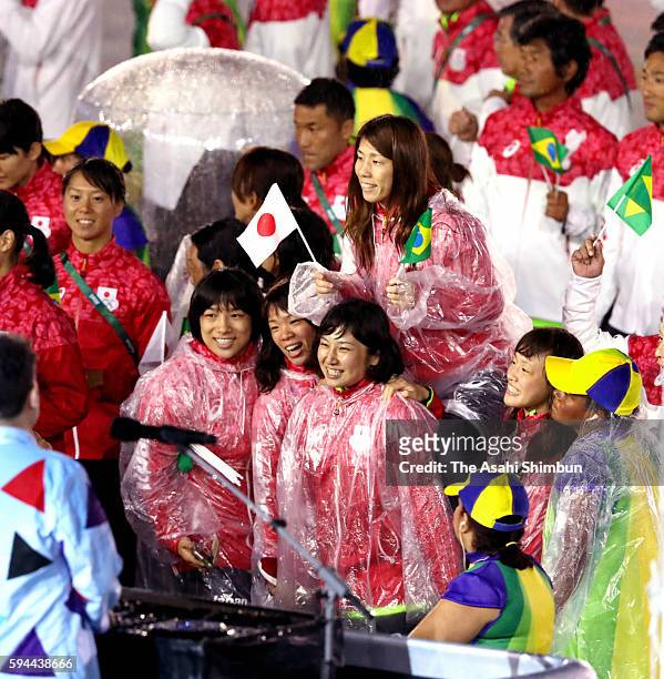 Sara Dosho, Eri Tosaka, Saori Yoshida, Risako Kawai and Rio Watari of Japan take part in the Closing Ceremony on Day 16 of the Rio 2016 Olympic Games...