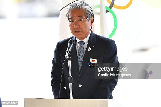 Japanese Olympic CommitteePresident Tsunekazu Takeda speaks during the "The Arrival of Olympic Flag Ceremony" at Haneda Airport on August 24, 2016 in...