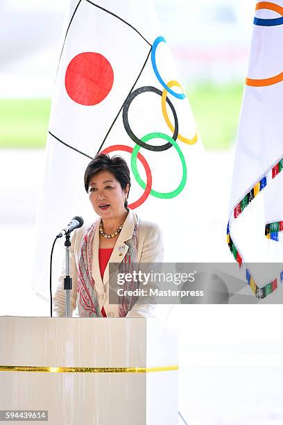 The governor of Tokyo Yuriko Koike speaks during the "The Arrival of Olympic Flag Ceremony" at Haneda Airport on August 24, 2016 in Tokyo, Japan.