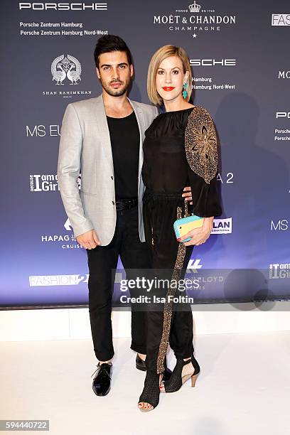 German actress Wolke Hegenbarth and her boyfriend Oliver Vaid attend the Fashion2Night event at EUROPA 2 on August 23, 2016 in Hamburg, Germany.