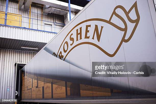 Trucks emblazoned with the logo "Roshen" stand at a despatch point at a factory on June 19, 2016 in Vinnytsia, Ukraine. Roshen Confectionery...