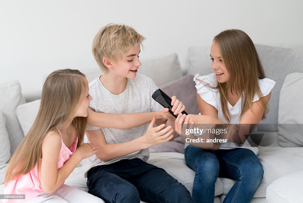 Kids fighting over the tv remote