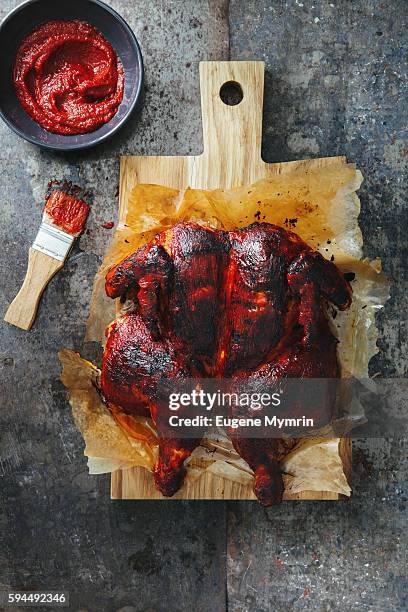 smoky barbecued chicken with vegetables - barbeque sauce stock pictures, royalty-free photos & images