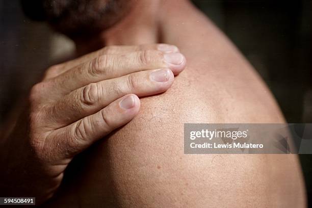 human shoulder close-ups - body men close up stock-fotos und bilder