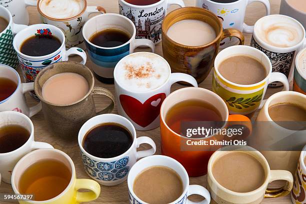 many cups of tea, coffee and hot chocolate - hot drink stock pictures, royalty-free photos & images