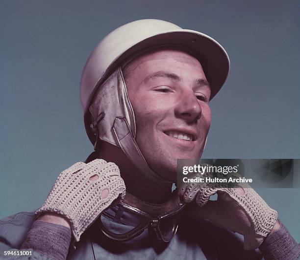 Studio portrait of British racing driver Stirling Moss, circa 1955.