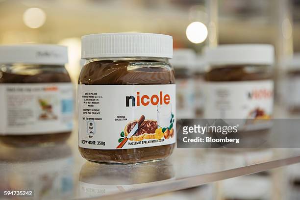 Jar of Ferrero SpA's Nutella hazelnut chocolate spread featuring the name Nicole on the label sits on display at a Nutella pop up store inside...
