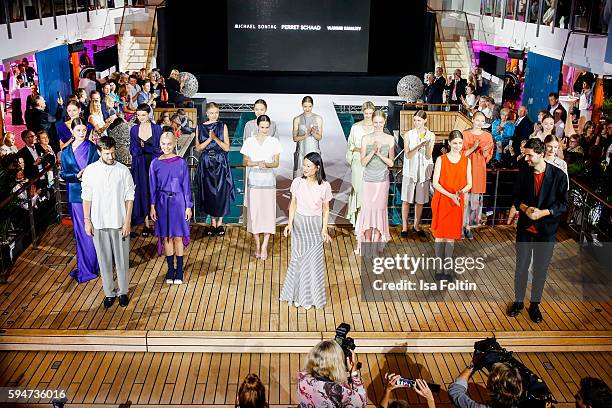 Group shot of models and the designers Michael Sontag, Tutia Schaad and Vladimir Karaleev at the Fashion2Night event at EUROPA 2 on August 23, 2016...