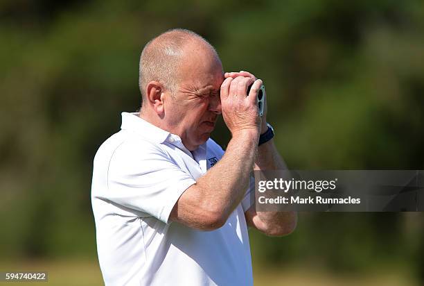 Professional Richard Green check his distance to the hole at the 12th during the PGA Super 60s Tournament at Gleneagles on August 24, 2016 in...