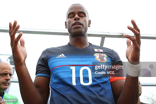 Ozu Moreira of Japan prays for before the Continental Beach Soccer Tournament match between Japan and Thailand at Municipal Sports Center on August...