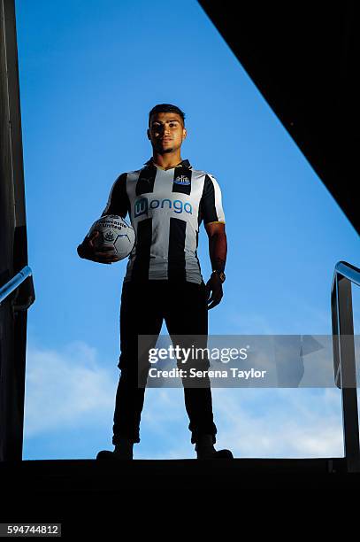 DeAndre Yedlin stands tall at the top of the steps leading to the stadium whilst holding a football under his arm after signing a 5 year contract at...