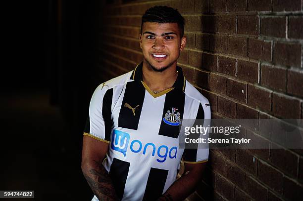 DeAndre Yedlin poses for photographs wearing a club shirt after signing a 5 year contract at St.James' Park on August 24 in Newcastle upon Tyne,...