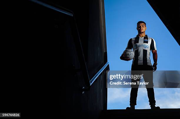 DeAndre Yedlin stands tall at the top of the steps leading to the stadium whilst holding a football under his arm after signing a 5 year contract at...