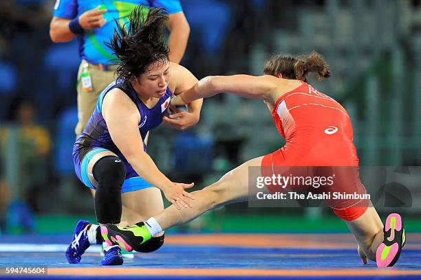 Sara Dosho of Japan and Natalia Vorobeva of Russia compete in the gold medal after the Women's 69kg gold medal contest on Day 12 of the Rio 2016...