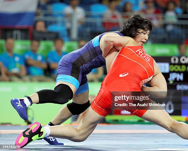 Sara Dosho of Japan and Natalia Vorobeva of Russia compete in the gold medal after the Women's 69kg gold medal contest on Day 12 of the Rio 2016...