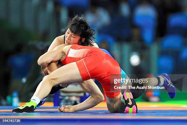 Sara Dosho of Japan and Natalia Vorobeva of Russia compete in the gold medal after the Women's 69kg gold medal contest on Day 12 of the Rio 2016...