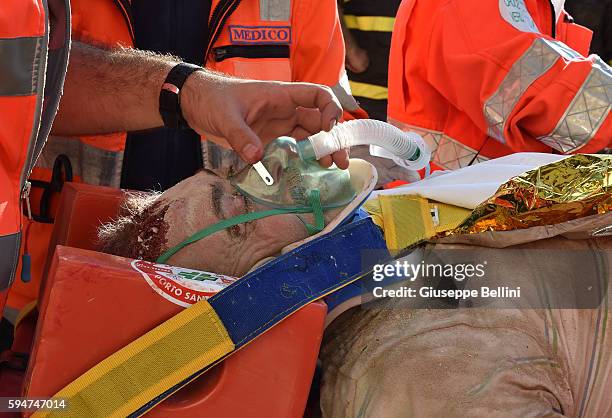 Year old Rocco Girardi is rescued from the ruins on August 24, 2016 in Arquata del Tronto, Italy. Central Italy was struck by a powerful...