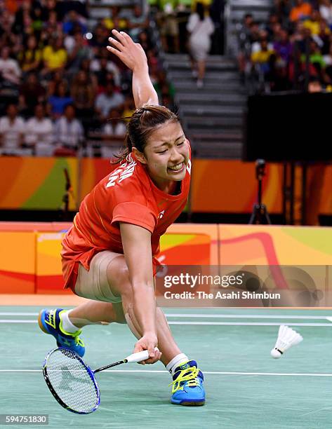 Nozomi Okuhara of Japan plays a shot during the Women's Badminton Singles Semi-final against Pusarla V Sindhu of India on Day 13 of the Rio 2016...