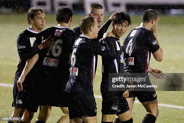 Patrick Antelmi of Blacktown is congratulated by team mates after scoring a goal during the round 16 FFA Cup match between Blacktown City and...