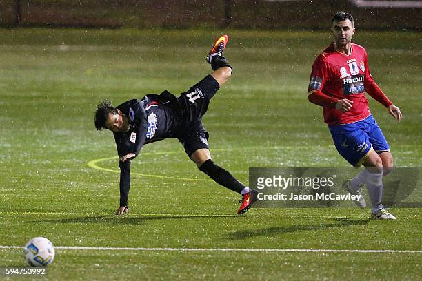 Danny Choi of Blacktown is challenged by Alexander Mansueto of Bonnyrigg during the round 16 FFA Cup match between Blacktown City and Bonnyrigg White...