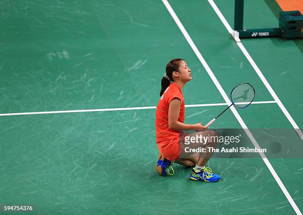 Nozomi Okuhara of Japan reacts during the Women's Badminton Singles Semi-final against Pusarla V Sindhu of India on Day 13 of the Rio 2016 Olympic...
